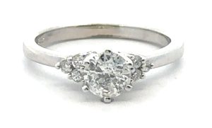 Engagement Ring with Triangle Accents