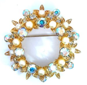 Vintage Aurora Borealis Rhinestone and pearl wreath pin. Circa 1959-1962.